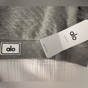 Grey quilted cropped sweatshirt from Alo Yoga